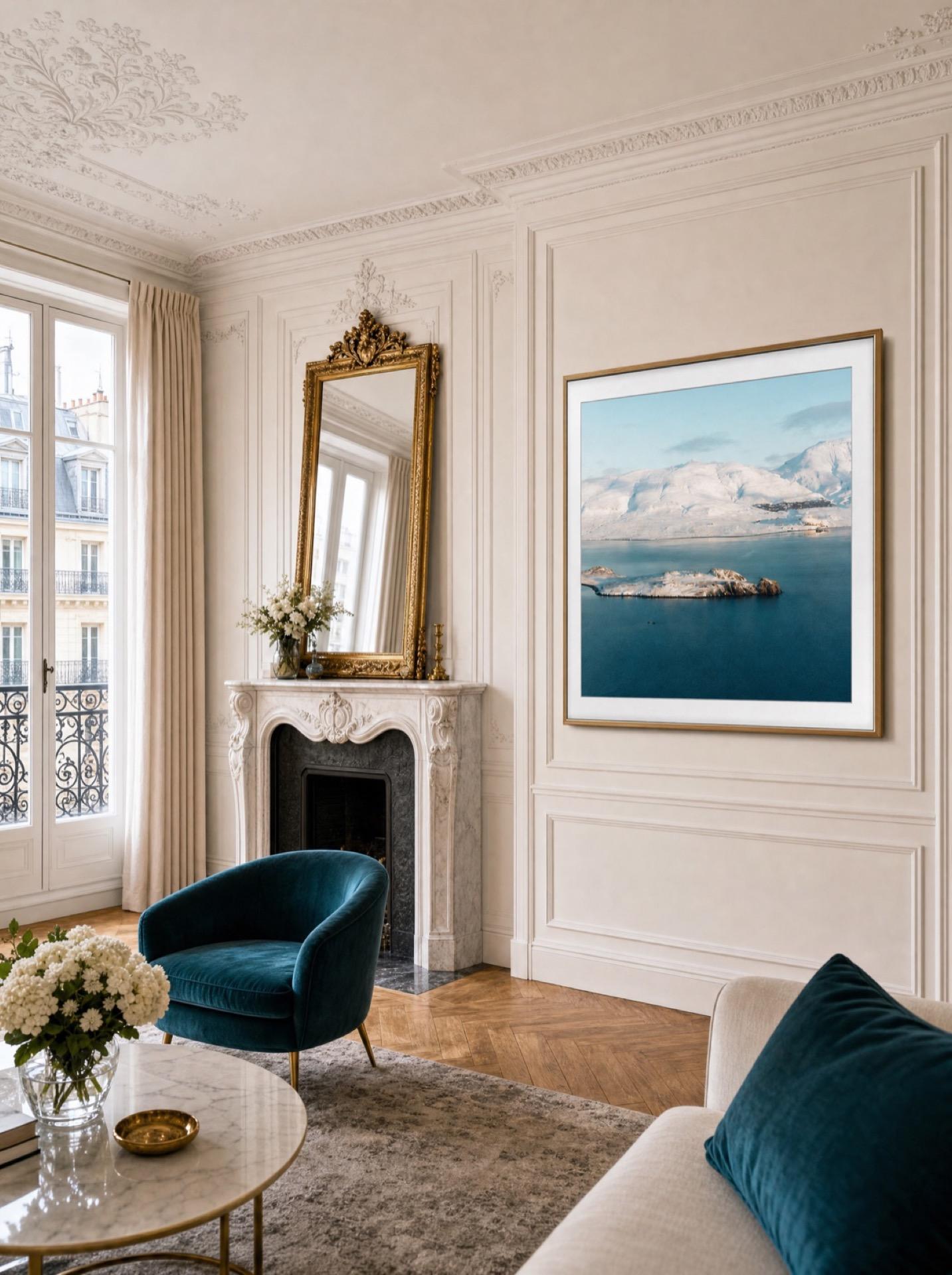 A Samsung The Frame TV showing a snowy fjord photo in an elegant Parisian apartment